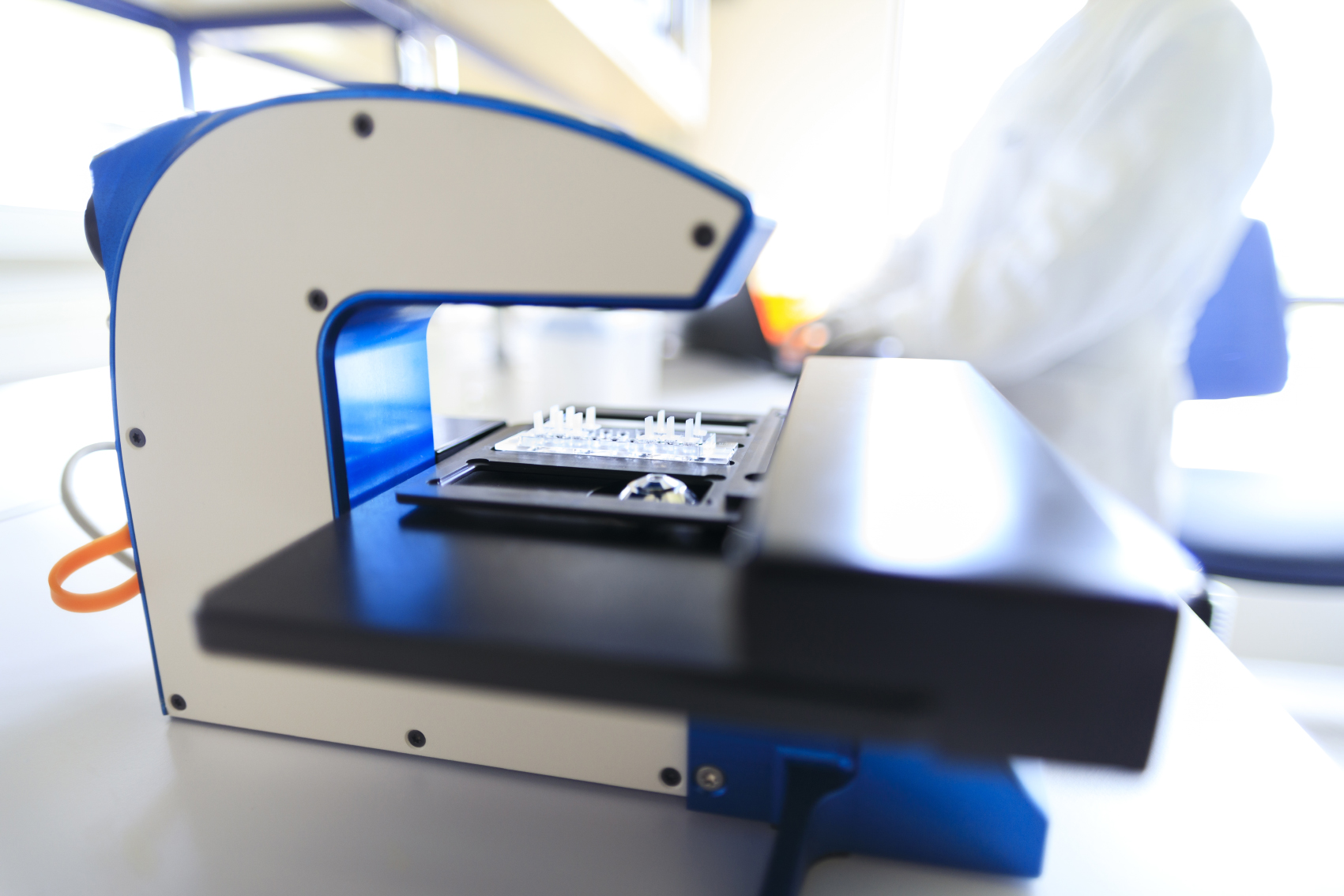 Closeup of the HoloMonitor live cell imaging microscope on a lab bench.